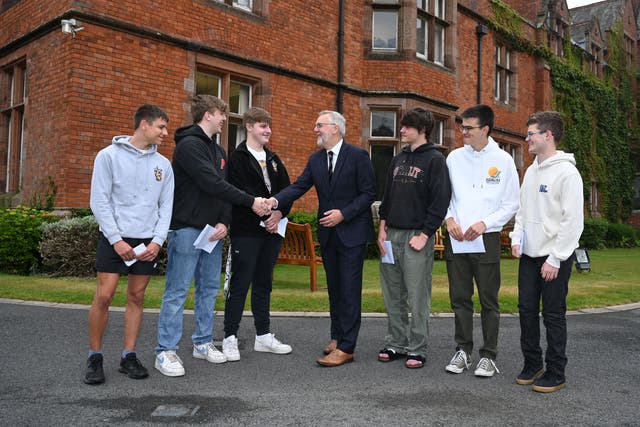 There were celebrations at schools across Belfast as students opened their A-level results (Michael Cooper/PA)