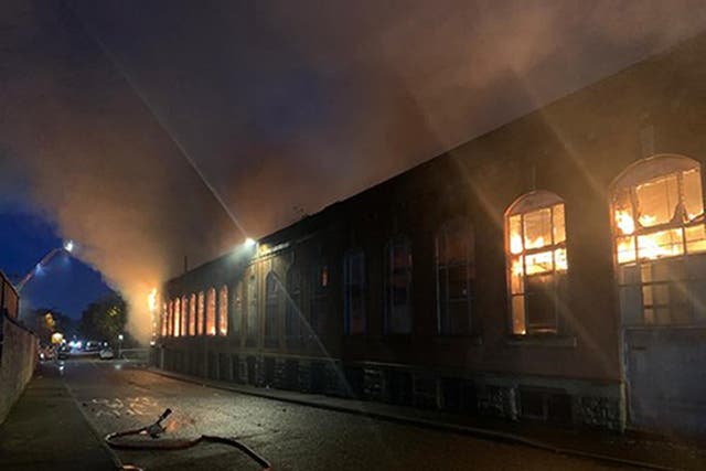 Two people have been arrested by police investigating four deaths following a fire at Bismark House Mill in Oldham in May (Greater Manchester Fire and Rescue Service/PA)