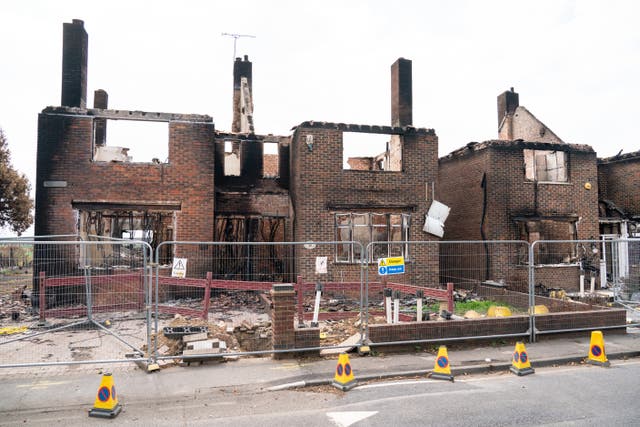 Fire damaged homes in the village of Wennington, in Havering, east London after a blaze on July 19th due to the hot weather. Picture date: Thursday August 18, 2022.