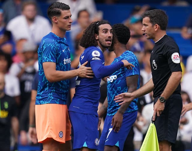 VAR official Mike Dean admits he made the wrong call over Cristian Romero’s hair-pull on Chelsea’s Marc Cucurella (John Walton/PA)