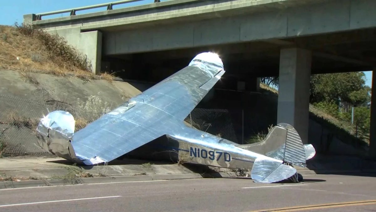 One person injured as small plane crashes next to California freeway