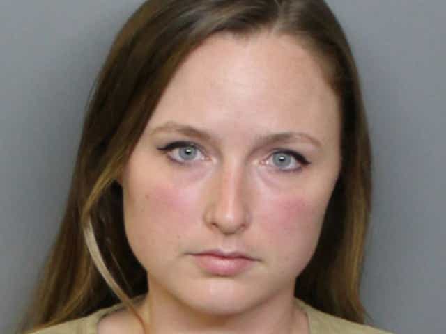 <p>Florida teacher Kelly Joyce Simpson, 31, was arrested on Tuesday for keeping a missing juvenile boy in her home</p>