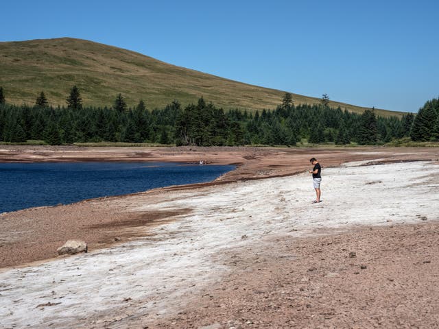 <p>Drying up: a reservoir in Wales that fell victim to the extreme heat in Britain this summer </p>