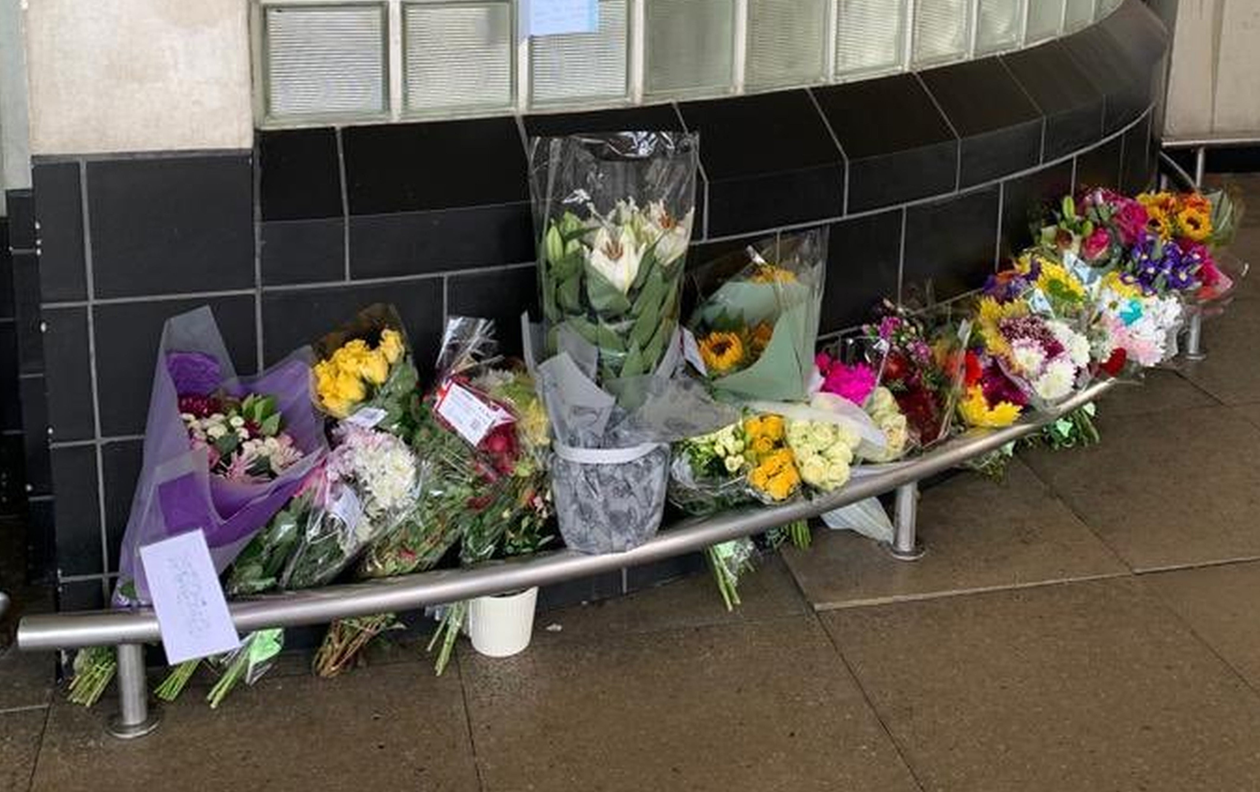 Flowers outside Perivale Tesco, Greenford, where 87-year-old Thomas O’Halloran who was fatally stabbed used to play his accordion (Ronaldo Butrus/PA)