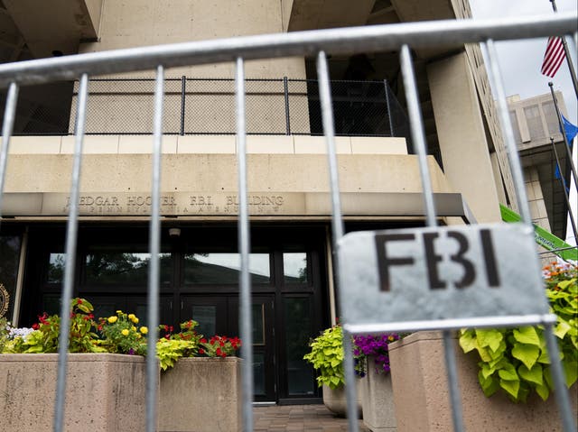 <p>FBI headquarters behind security fencing in Washington, DC</p>