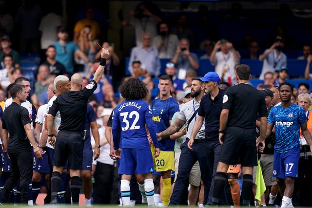<p>Thomas Tuchel, right of centre, is pulled back from confrontation with Antonio Conte after Chelsea’s 2-2 draw with Tottenham</p>