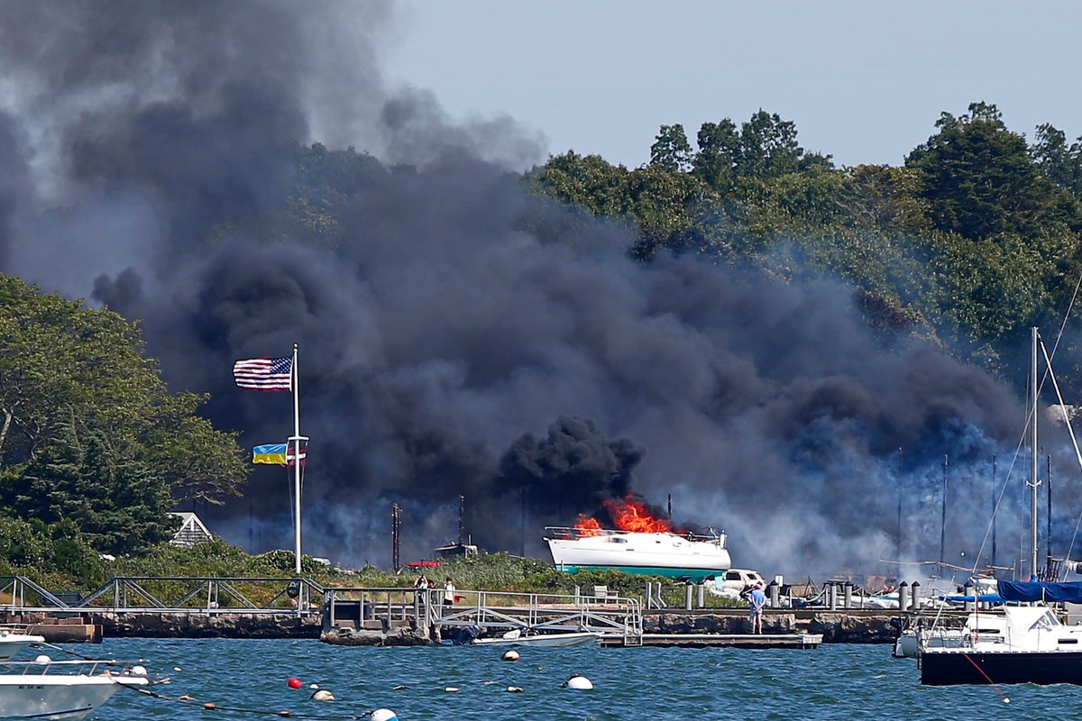 Massive marina fire torches boats, cars and buildings in Massachusetts