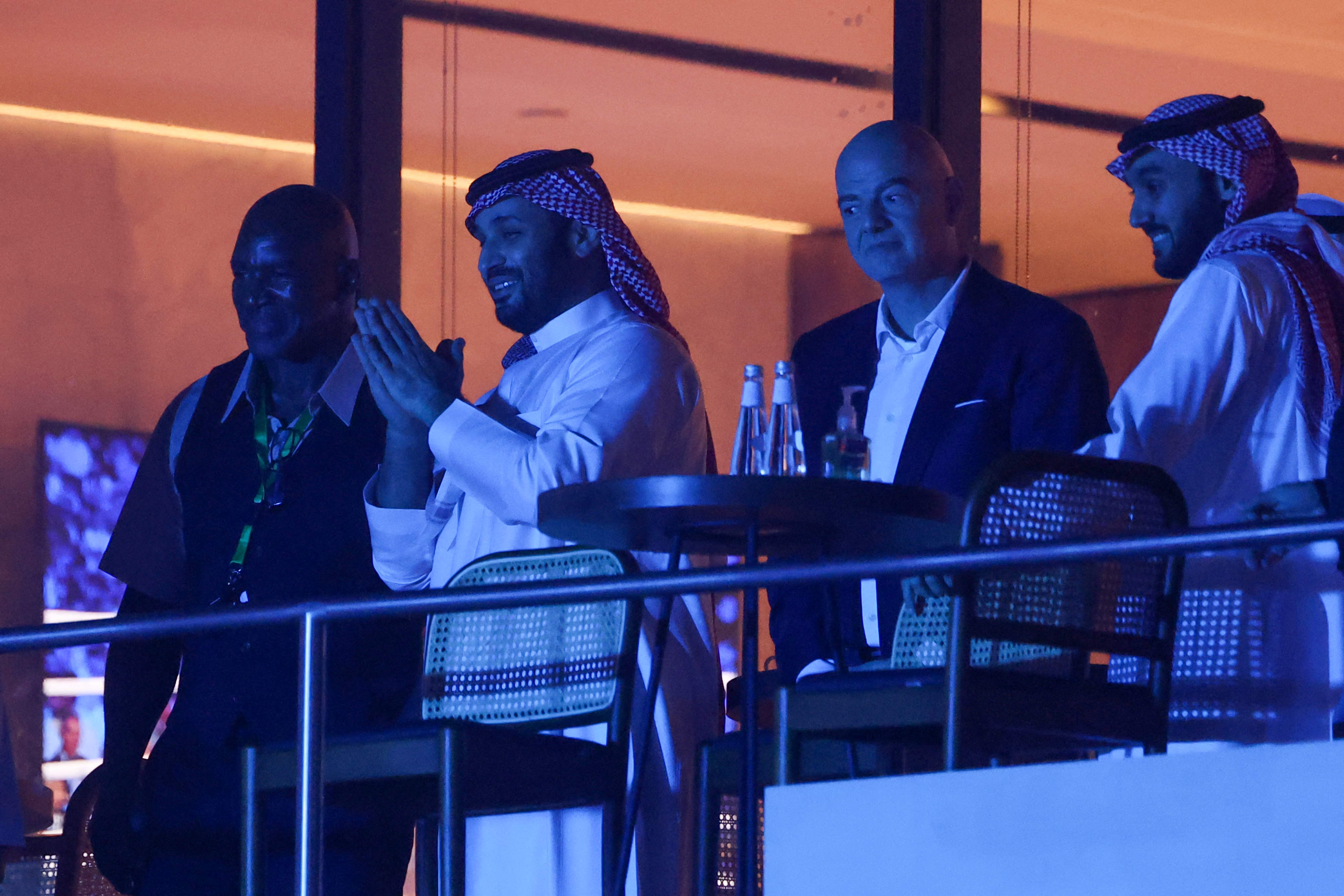 Saudi Crown Prince Mohammed bin Salman (2nd-L) is pictured with FIFA president Gianni Infantino