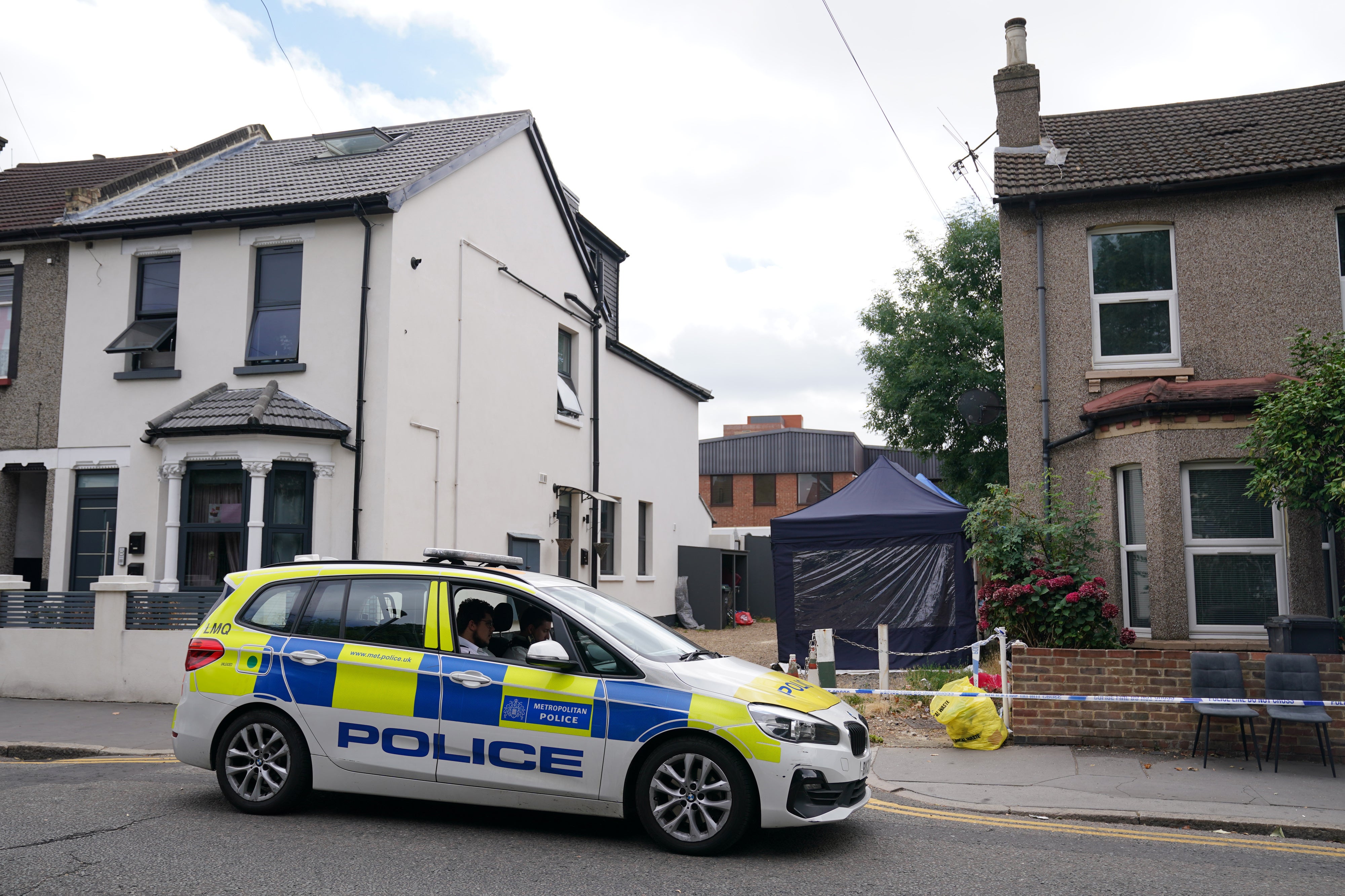 Police outside a property in Derby Road (Kirsty O’Connor/PA)