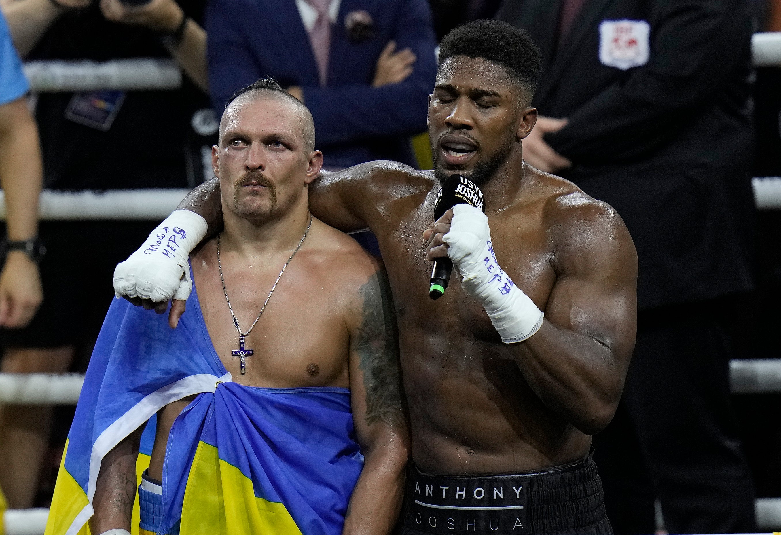 Oleksandr Usyk (left) outpointed Anthony Joshua for the second time in 11 months