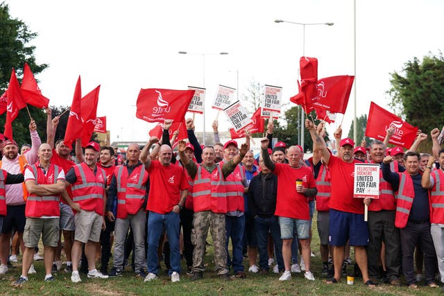 <p>Members of the Unite union on a picket line at one of the entrances to the Port of Felixstowe</p>