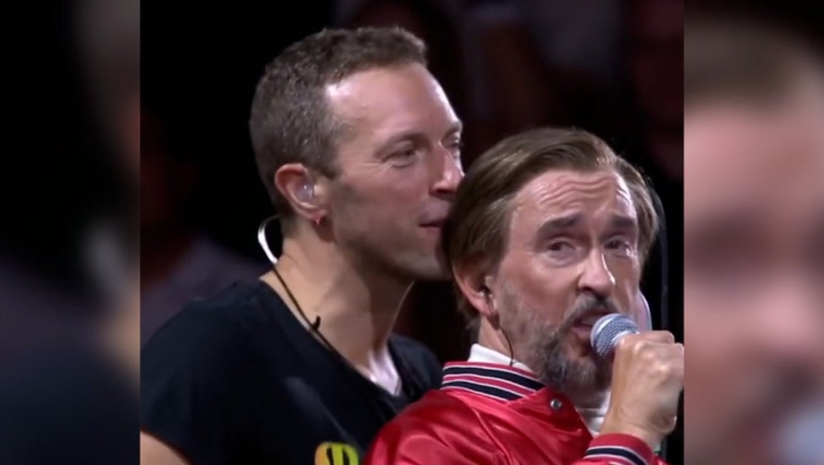Coldplay bring out Steve Coogan as Alan Partridge to sing Kate Bush at Wembley