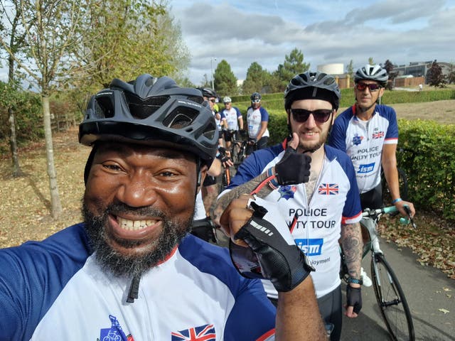<p>Festus Akinbusoye, the Conservative candidate in the Mid Bedfordshire by-election, gets on his bike  </p>