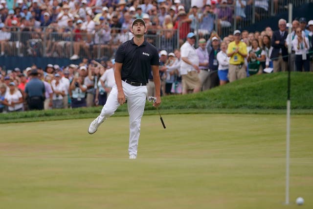 Patrick Cantlay reacts after missing a putt on the 18th hole during the final round of the BMW Championship (Julio Cortez/AP)