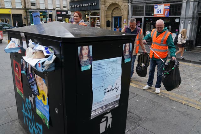Rubbish bins in Edinburgh have not been emptied as the result of a strike by cleaning workers (Andrew Milligan/PA)
