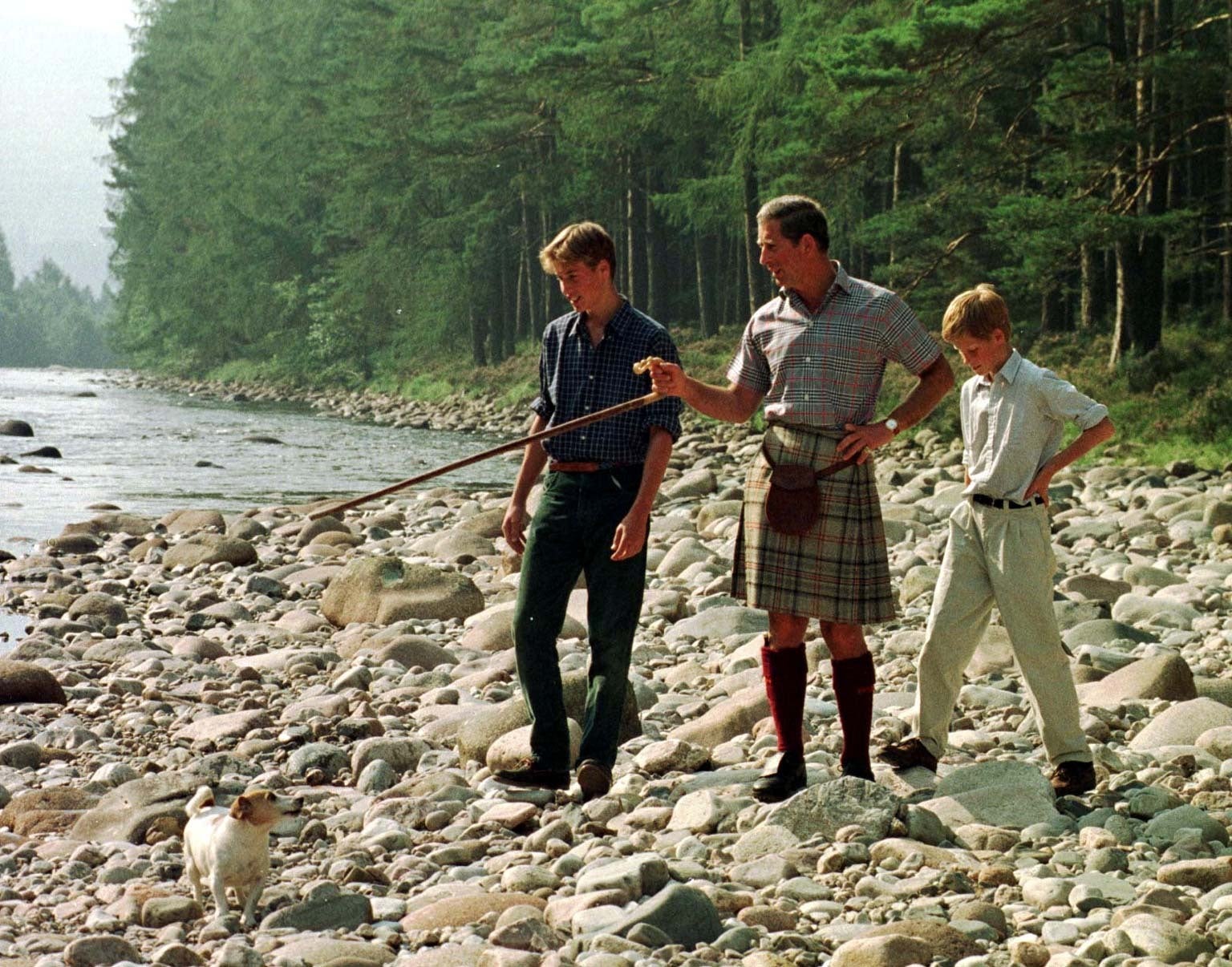 The Prince of Wales and his sons William, 15, and Harry, 12, take an early morning walk along the banks of the River Dee on the Balmoral estate in 1997