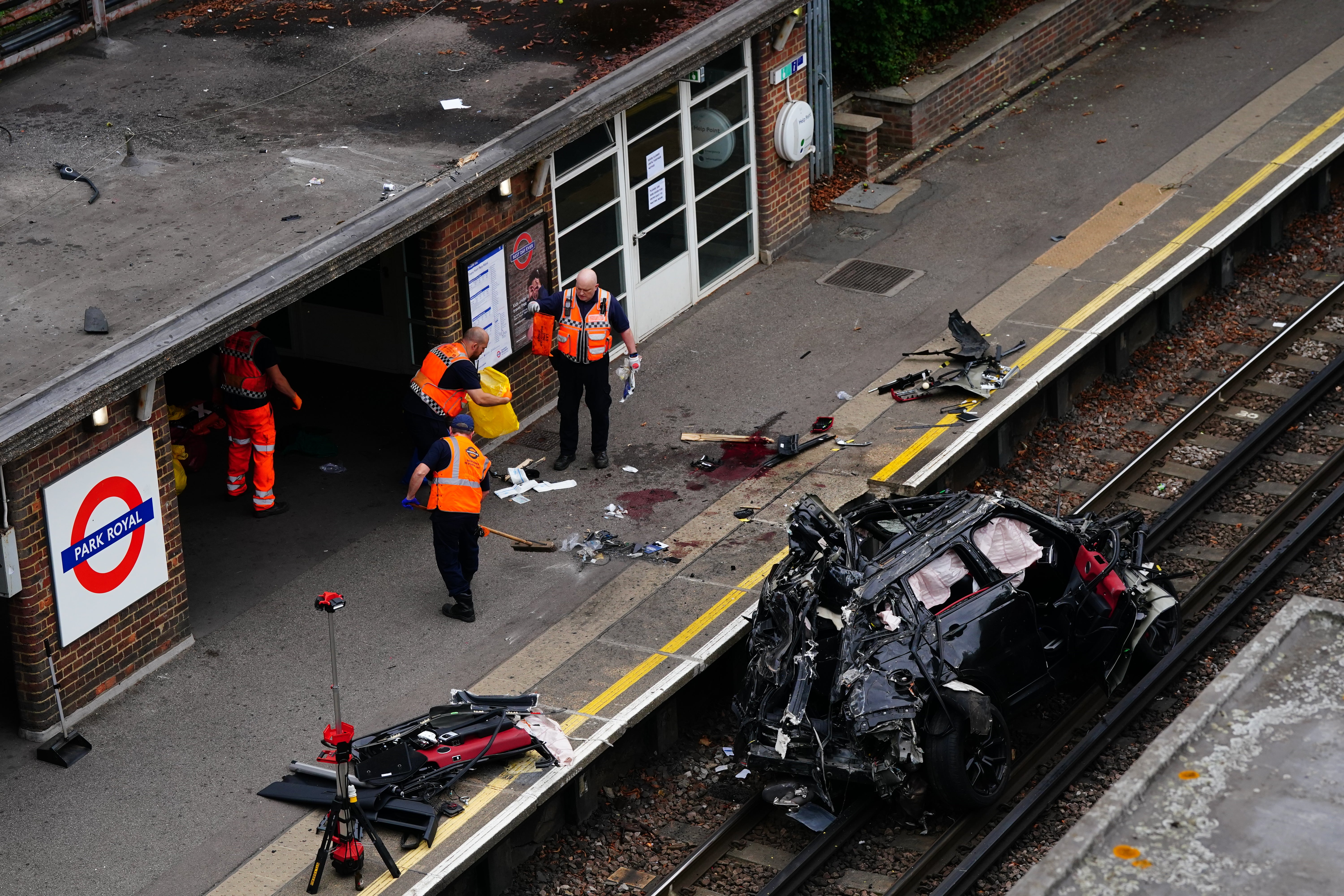 The scene of a fatal crash in west London in which a Range Rover ended up on a railway track (Victoria Jones/PA)