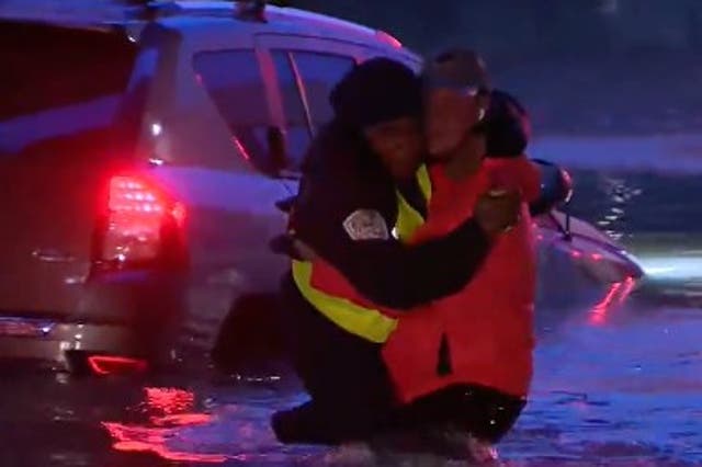 <p>A TV weather crew rescued a woman stuck in her car as they reported live on flash flooding in Dallas.</p>