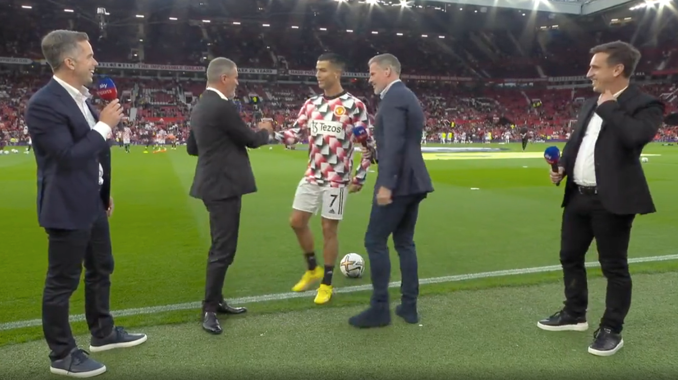 Cristiano Ronaldo ignores Jamie Carragher on the touchline