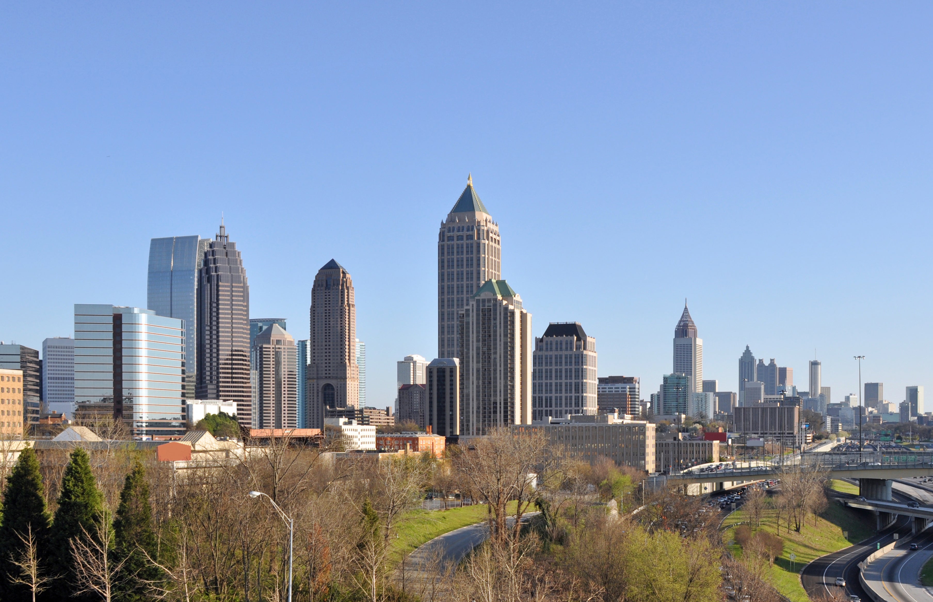 A view of the skyline of Atlanta, Georgia with midtown in the foreground and downtown in the background.