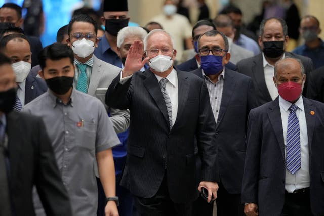 <p>A lower court in 2020 found the former prime minister (centre) guilty of abuse of power, money laundering and criminal breach of trust </p>