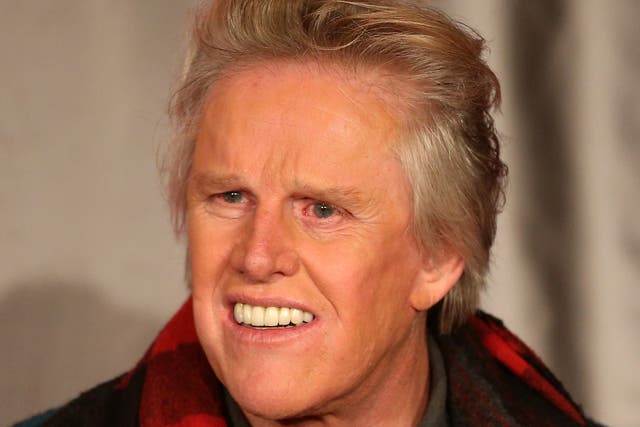 <p>Actor Gary Busey speaks onstage at the "All Star Celebrity Apprentice" in 2013 </p>