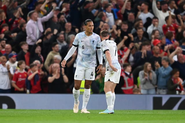 <p>James Milner and Virgil van Dijk have a heated inquest after Manchester United take the lead </p>