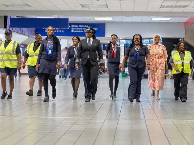 <p>The all-female, all-Black American Airlines crew</p>