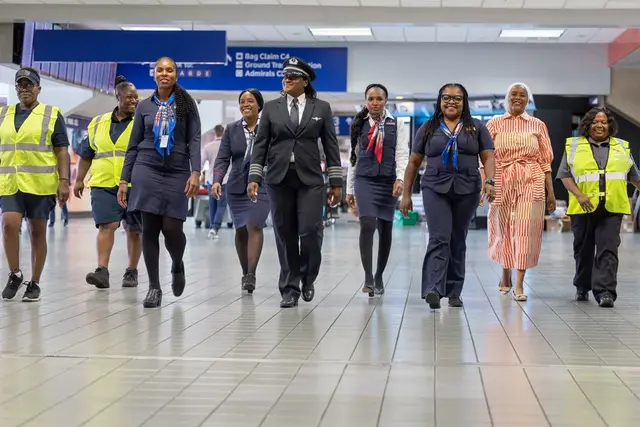 <p>The all-female, all-Black American Airlines crew</p>