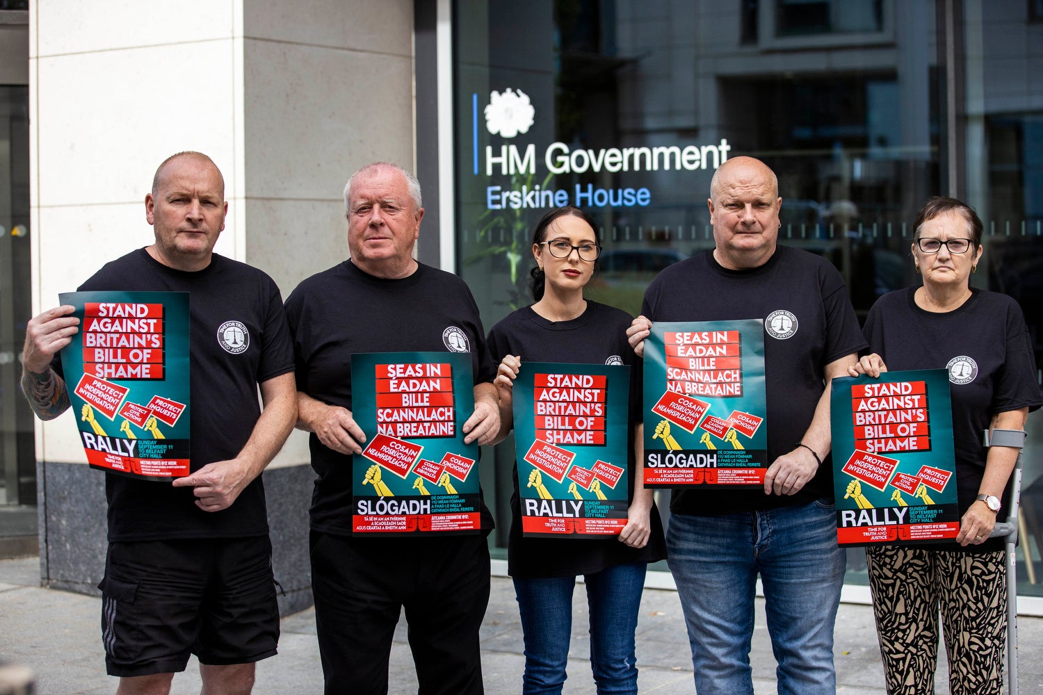 Protesters at the Stand Against Britain’s Bill Of Shame Rally outside the Northern Ireland Office at Erskine House in Belfast (Liam McBurney/PA)