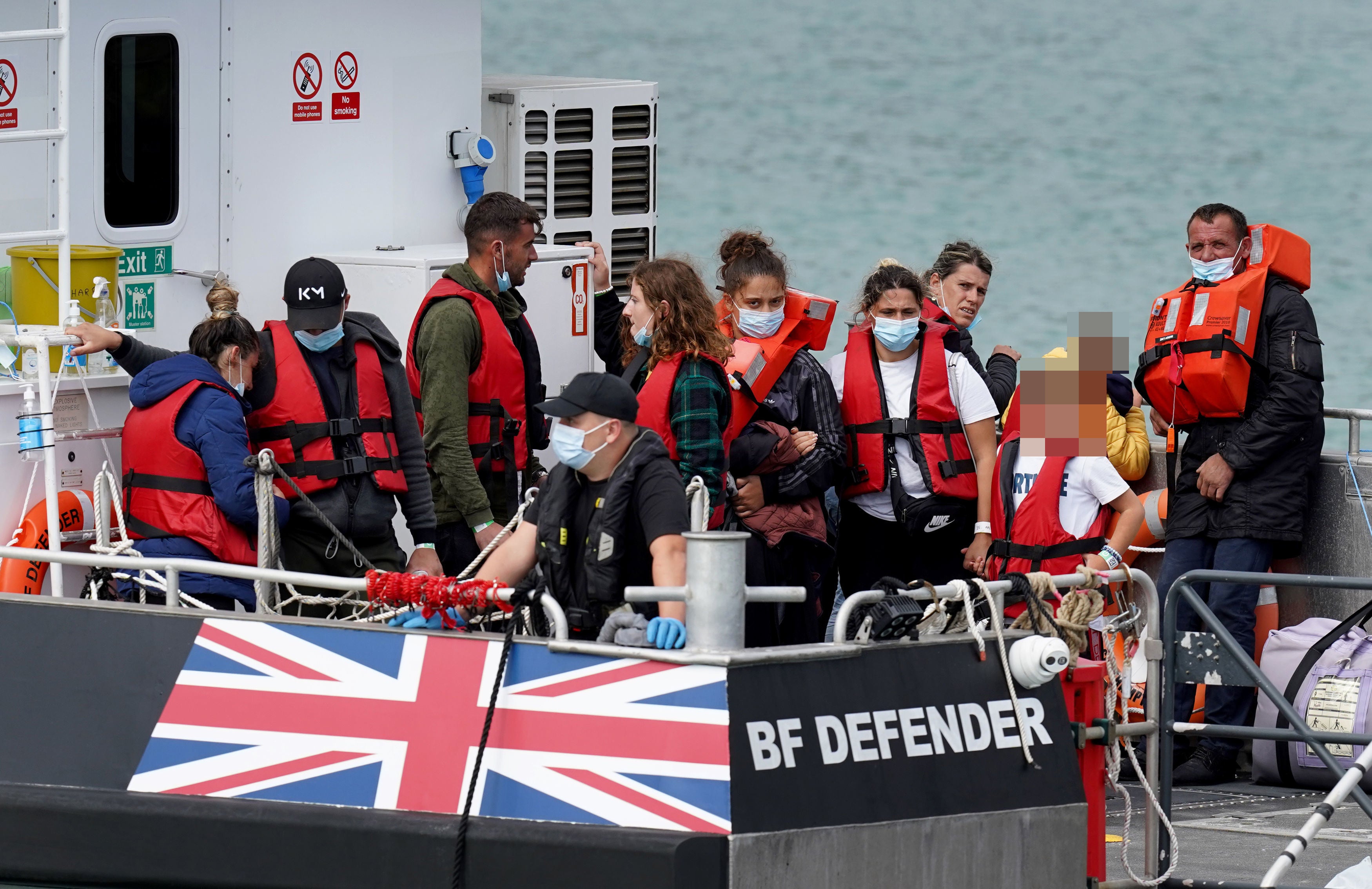 A group of people thought to be migrants are brought into Dover, Kent, onboard a Border Force Vessel on Tuesday, following a small boat incident in the Channel