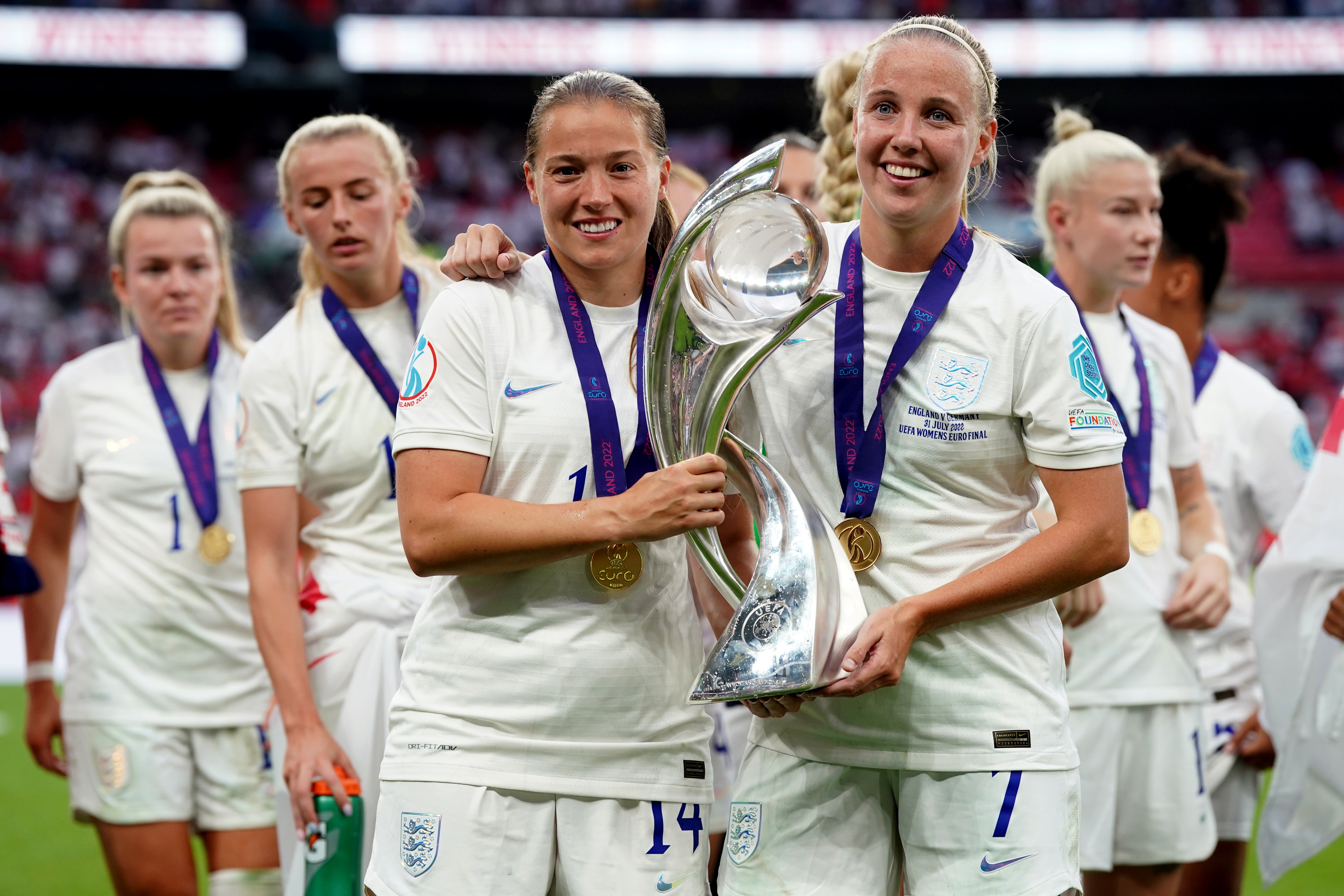 Beth Mead, right, holds the Euro 2022 trophy with England team-mate Fran Kirby (Nick Potts/PA)
