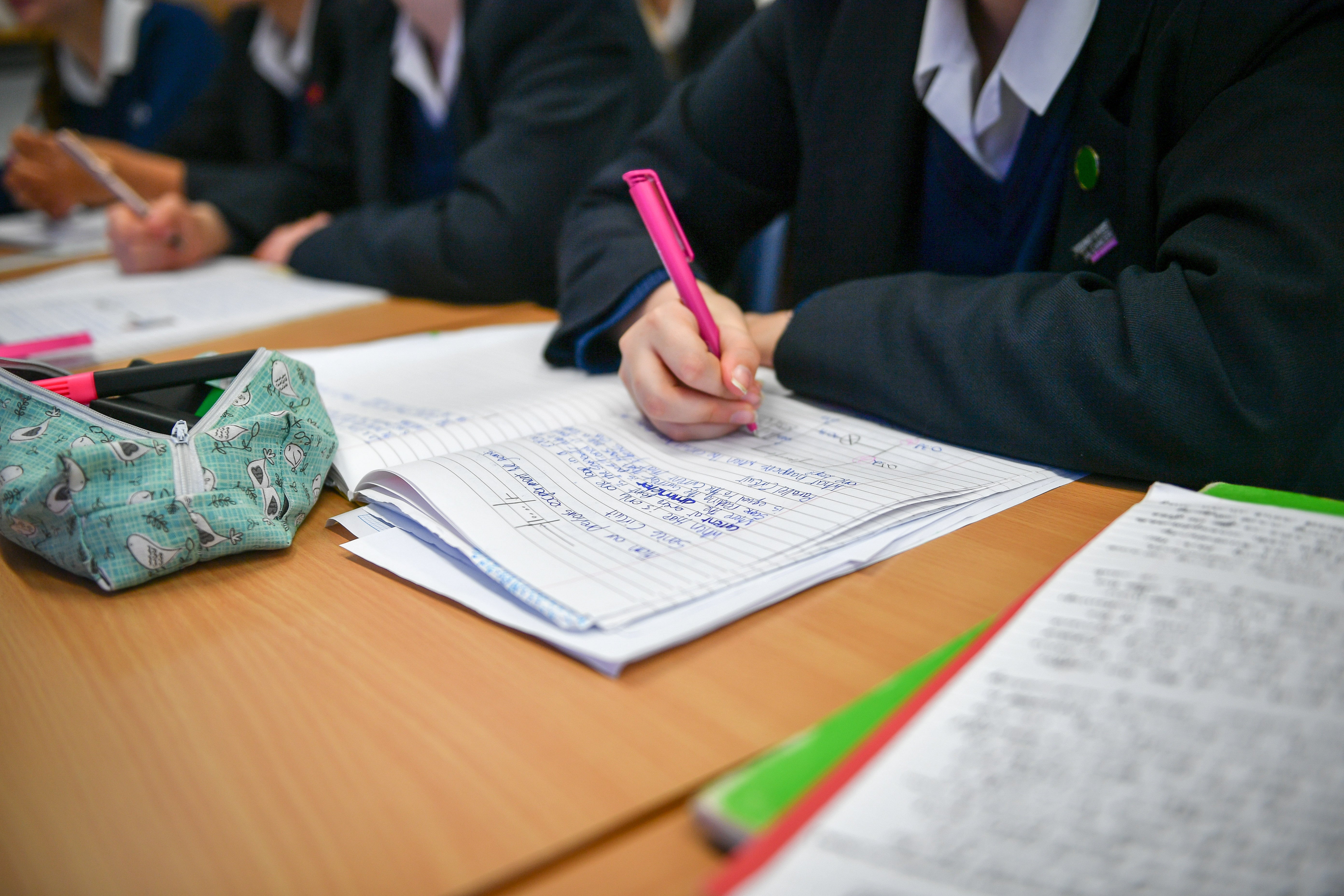 Ofsted should not rush to judge schools with lower GCSE grades after the pandemic, an education group has urged (Ben Birchall/PA)