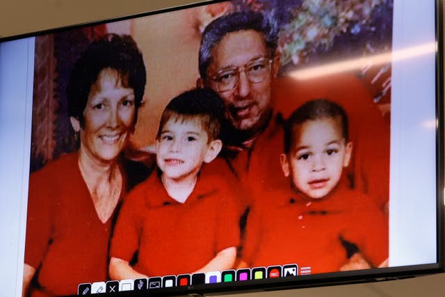 <p>An undated photograph of the Cruz family is shown in the courtroom during the penalty phase of the trial of Marjory Stoneman Douglas High School shooter Nikolas Cruz at the Broward County Courthouse</p>