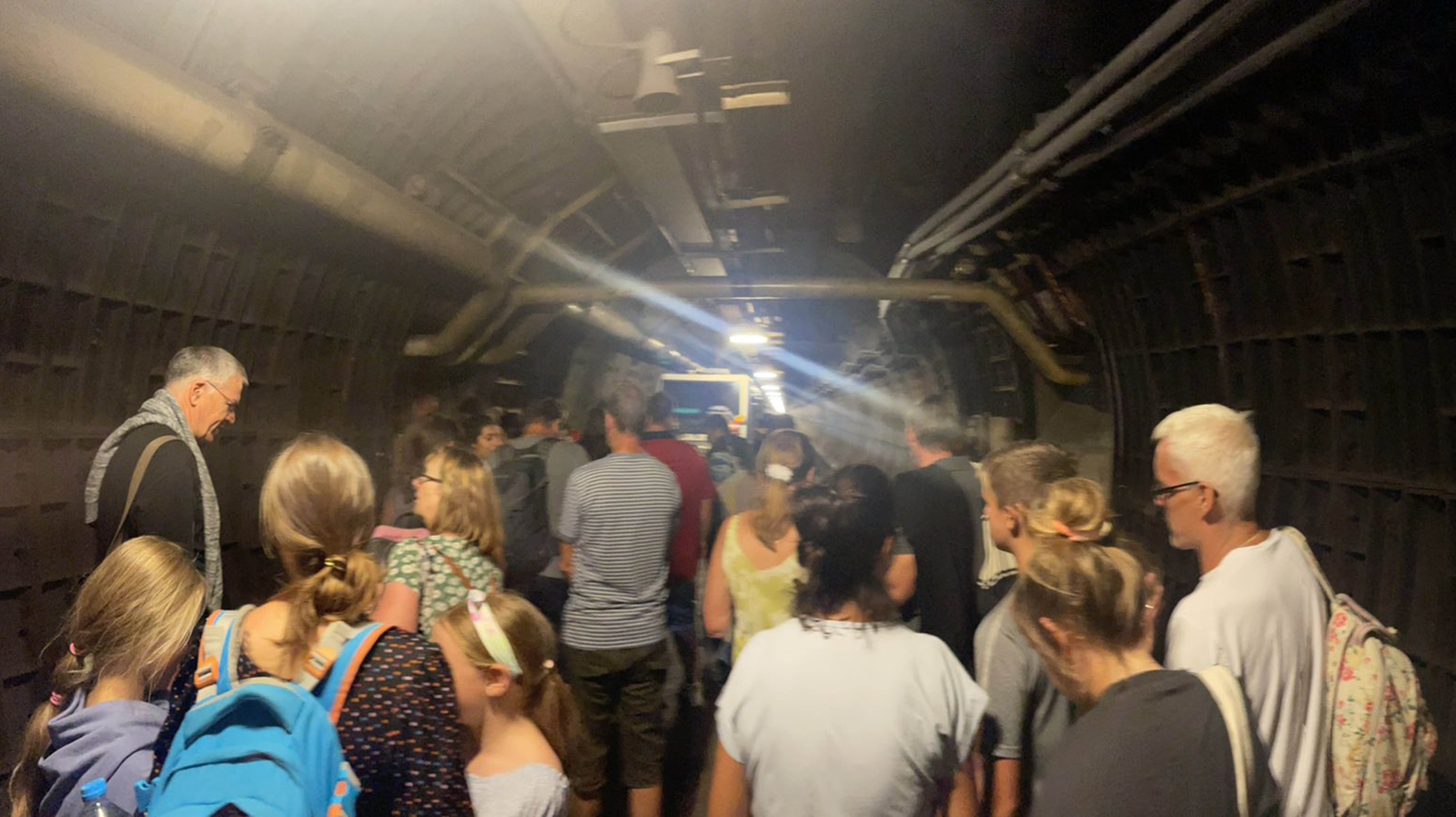 Passengers in the ‘service tunnel’ after a Calais-to-Folkestone shuttle came to a halt
