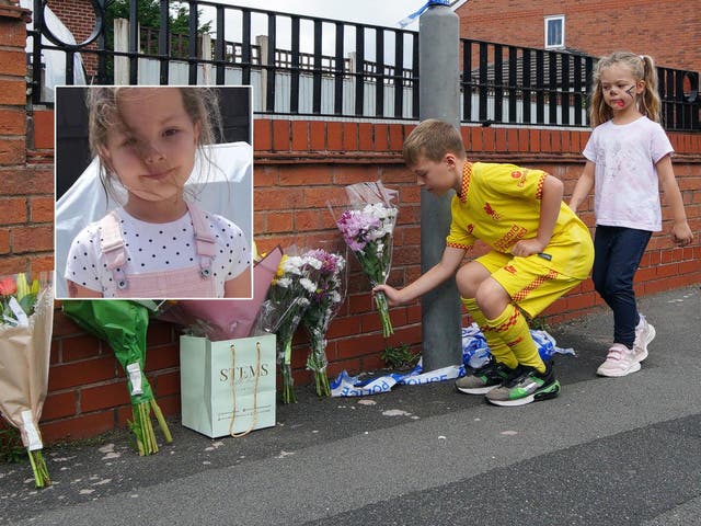 <p>Children leave flowers near to the scene in Kingsheath Avenue, Knotty Ash, Liverpool, where nine-year-old Olivia?Pratt-Korbel was killed </p>