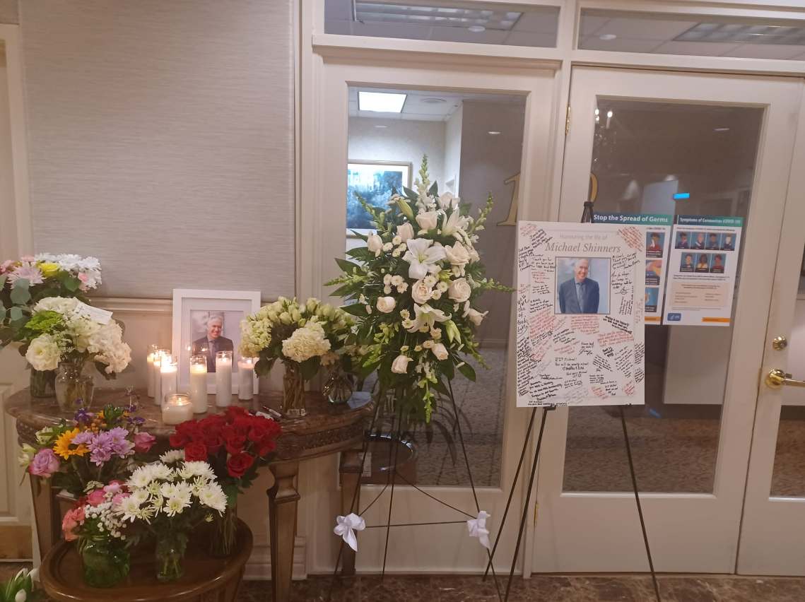 A vigil was held Tuesday night at 1280 West to commemorate Property Manager Michael Shinners, who was killed during the Monday night shooting, and Chief Building Engineer Mike Horne, who remains in hospital