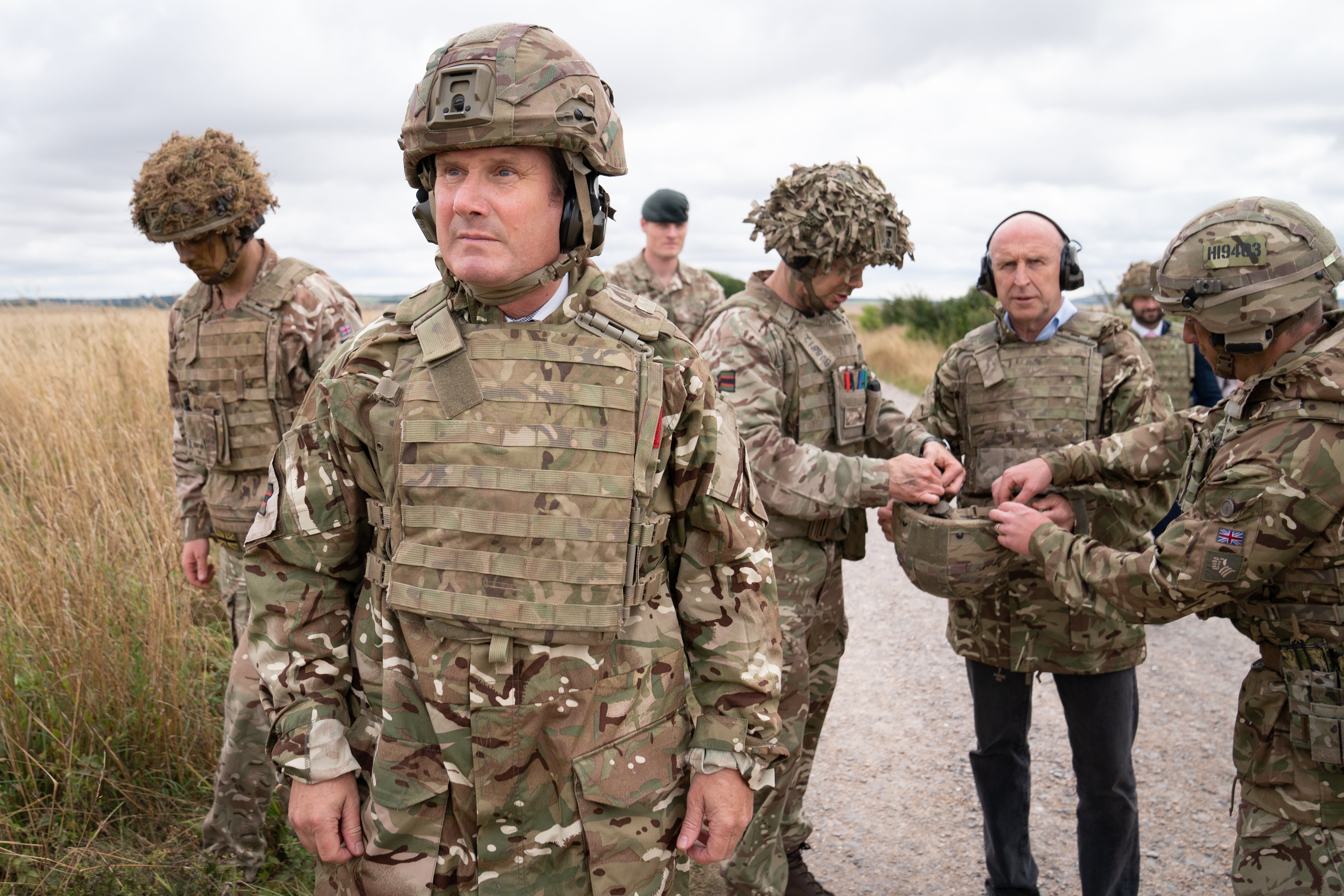 Labour leader Sir Keir Starmer and shadow defence secretary, John Healey (centre right) meets British soldiers at Salisbury Plain (Stefan Rousseau/PA)