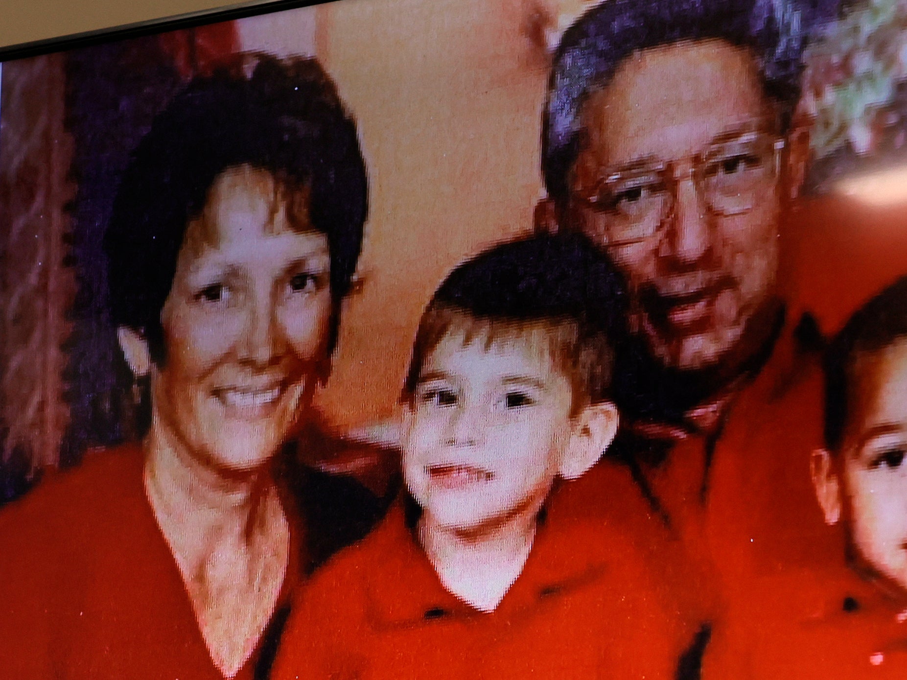 Nikolas Cruz as a child with his adoptive parents Lynda and Roger