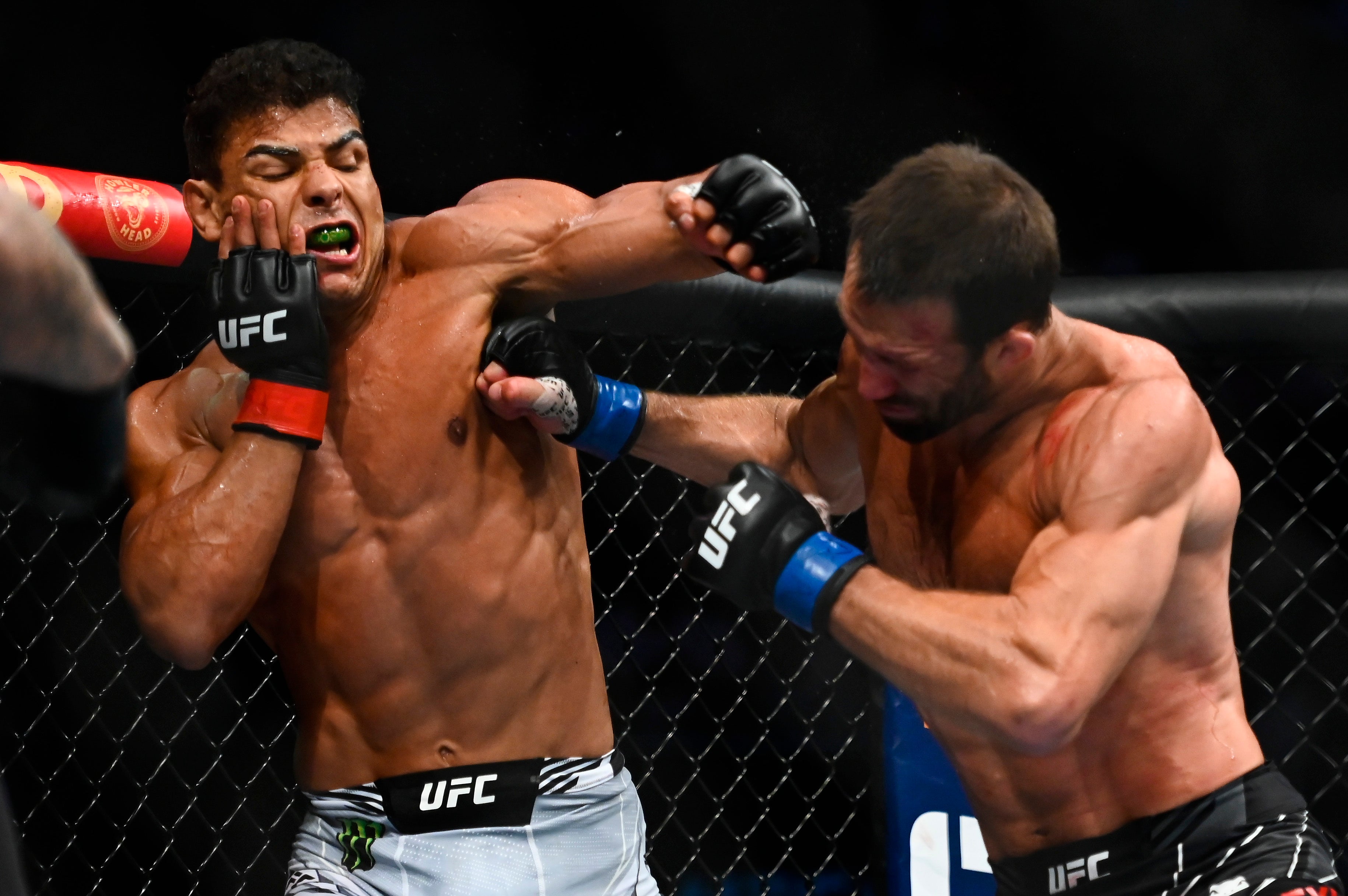 Paulo Costa (left) outpointed Luke Rockhold, who then appeared to retire from MMA