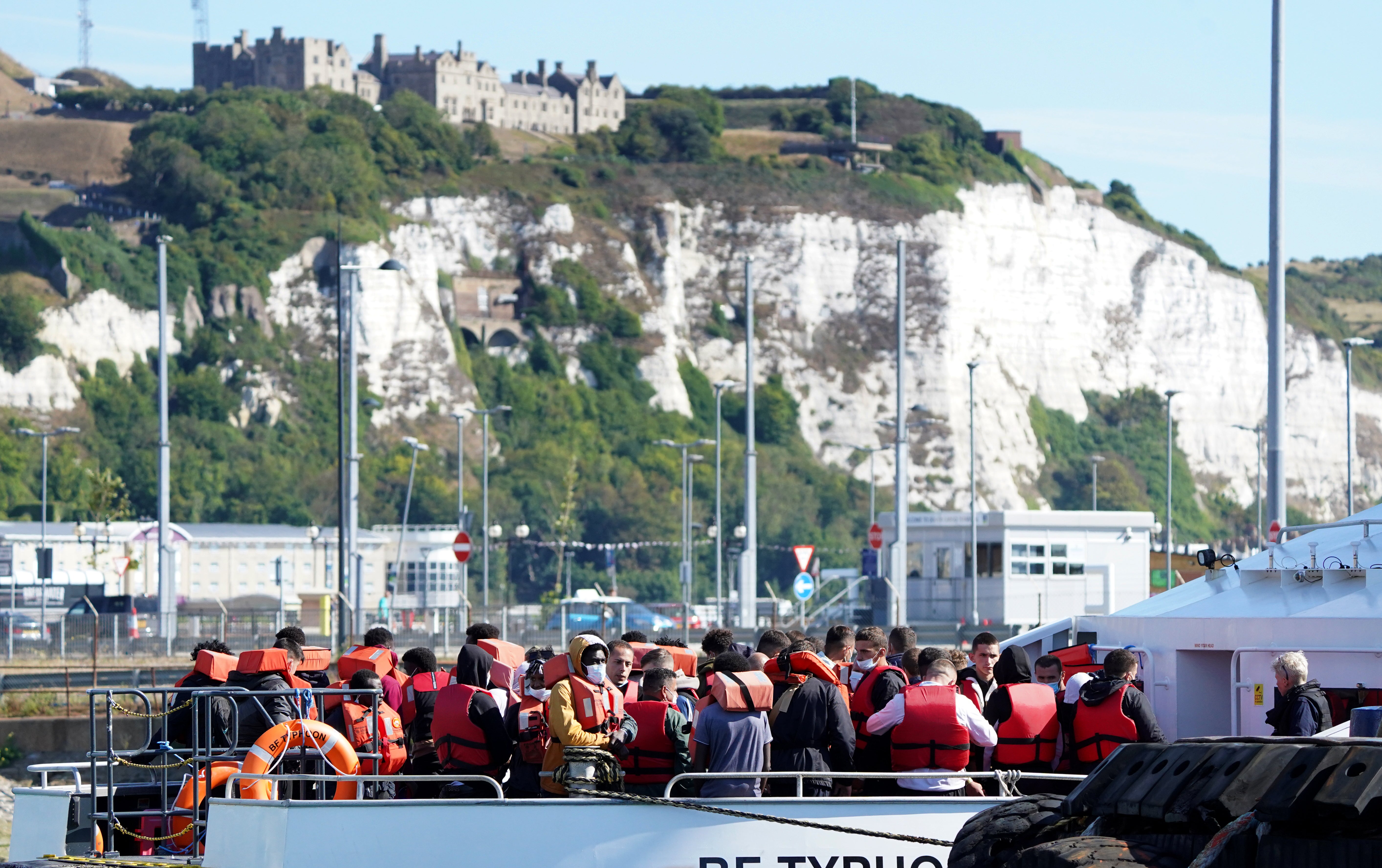 A group of people thought to be migrants are brought in to Dover, Kent, from a Border Force Vessel (Gareth Fuller/PA)
