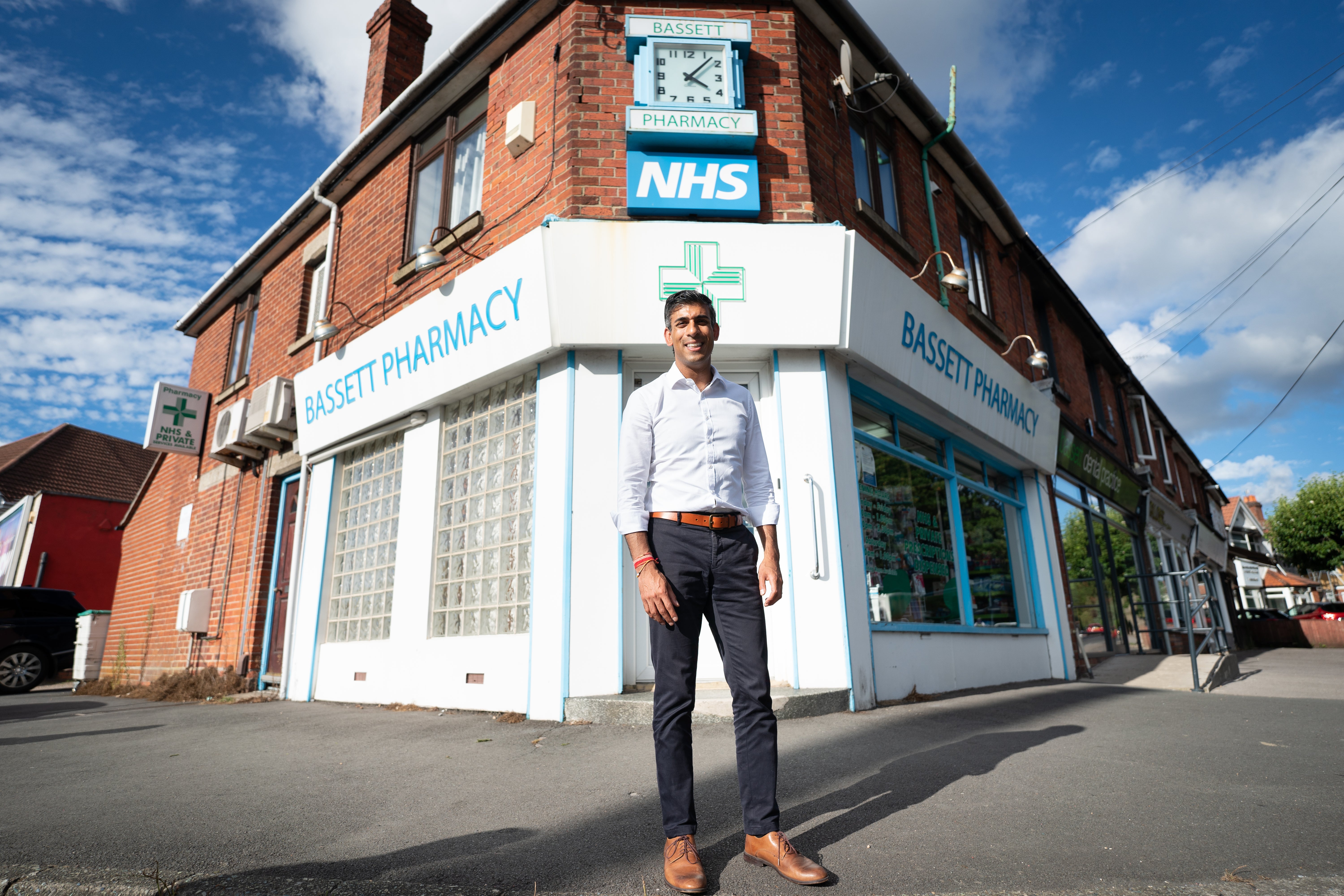 Rishi Sunak during a visit to his family’s old business, Bassett Pharmacy, in Southamptpn (Stefan Rousseau/PA)