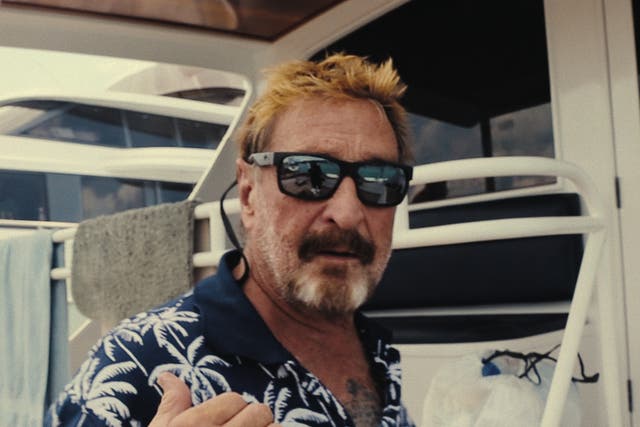 <p> Running with the Devil: The Wild World of John McAfee. John McAfee in Running with the Devil: The Wild World of John McAfee. Cr. Courtesy of Netflix © 2022</p>