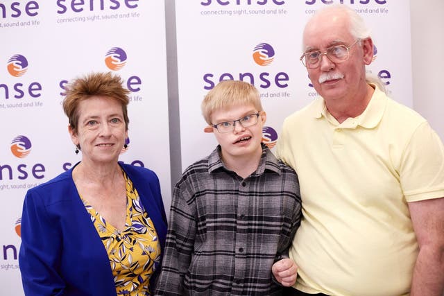 Keith Butler with son Geordie and partner Helen (Sense/PA)