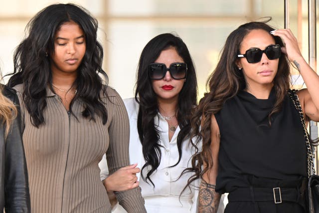 <p>Vanessa Bryant (C), wife of the late Los Angeles Lakers basketball player Kobe Bryant, her daughter Natalia Bryant (L), and close friend Sydney Leroux (R) depart the court house in Los Angeles, California, on August 24, 2022, after a verdict was reached in Bryant's federal negligence lawsuit against Los Angeles County</p>