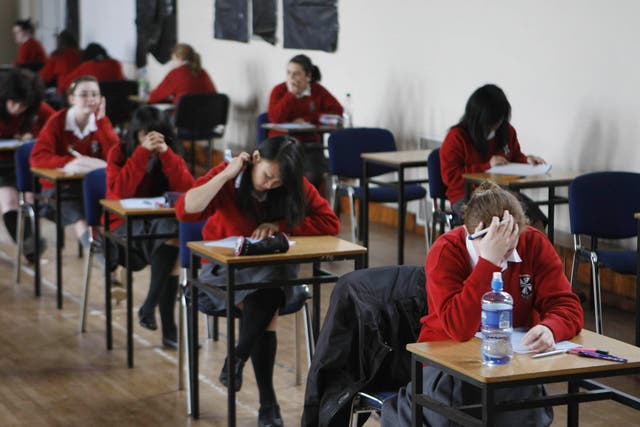 File photo of students sitting an exam (Niall Carson/PA)