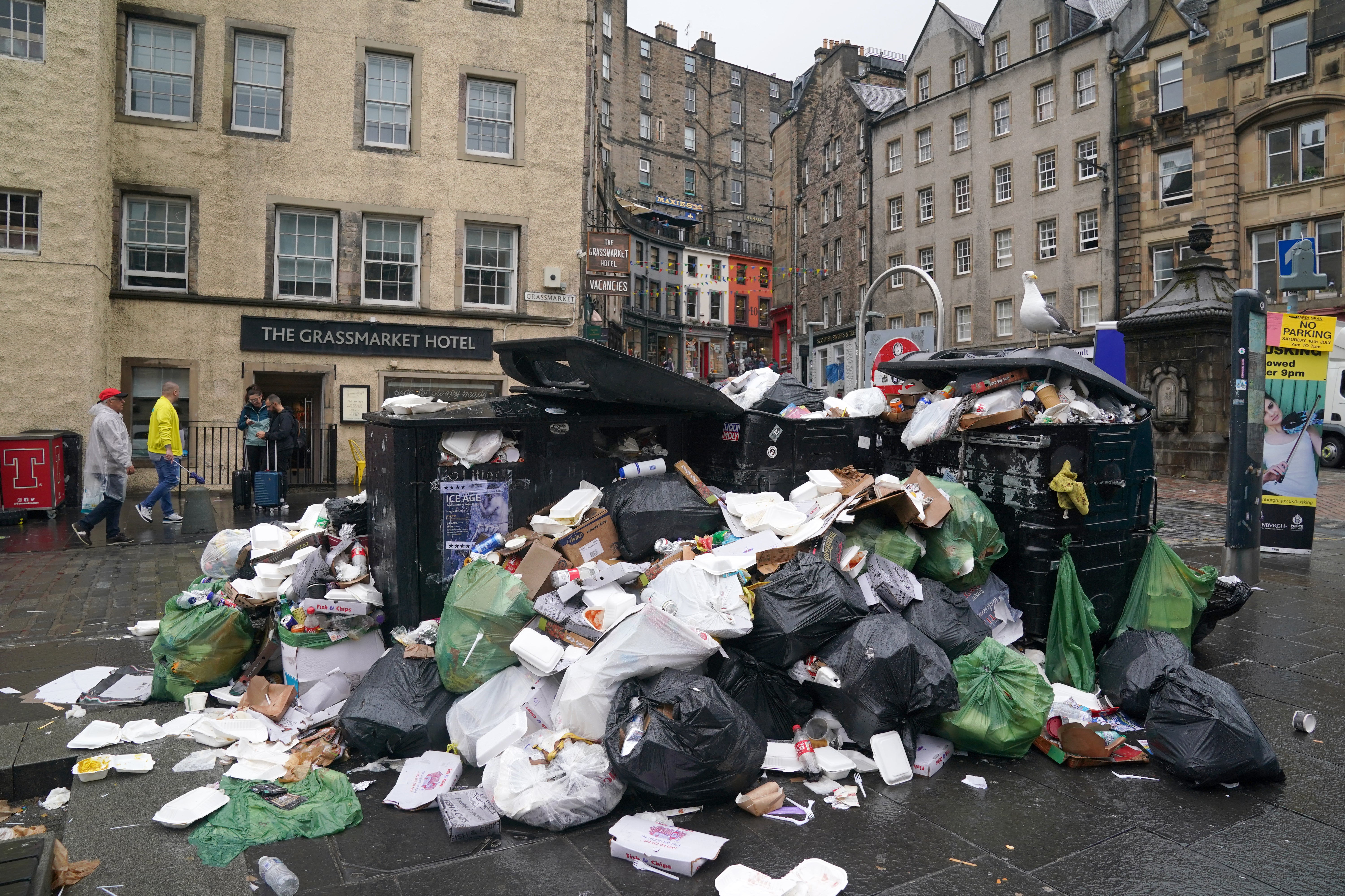 Rubbish sprawls into the street in Edinburgh as the strikes continue