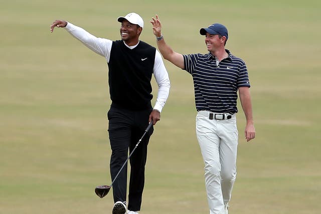 <p>Tiger Woods (left) remains Rory McIlroy’s hero </p>
