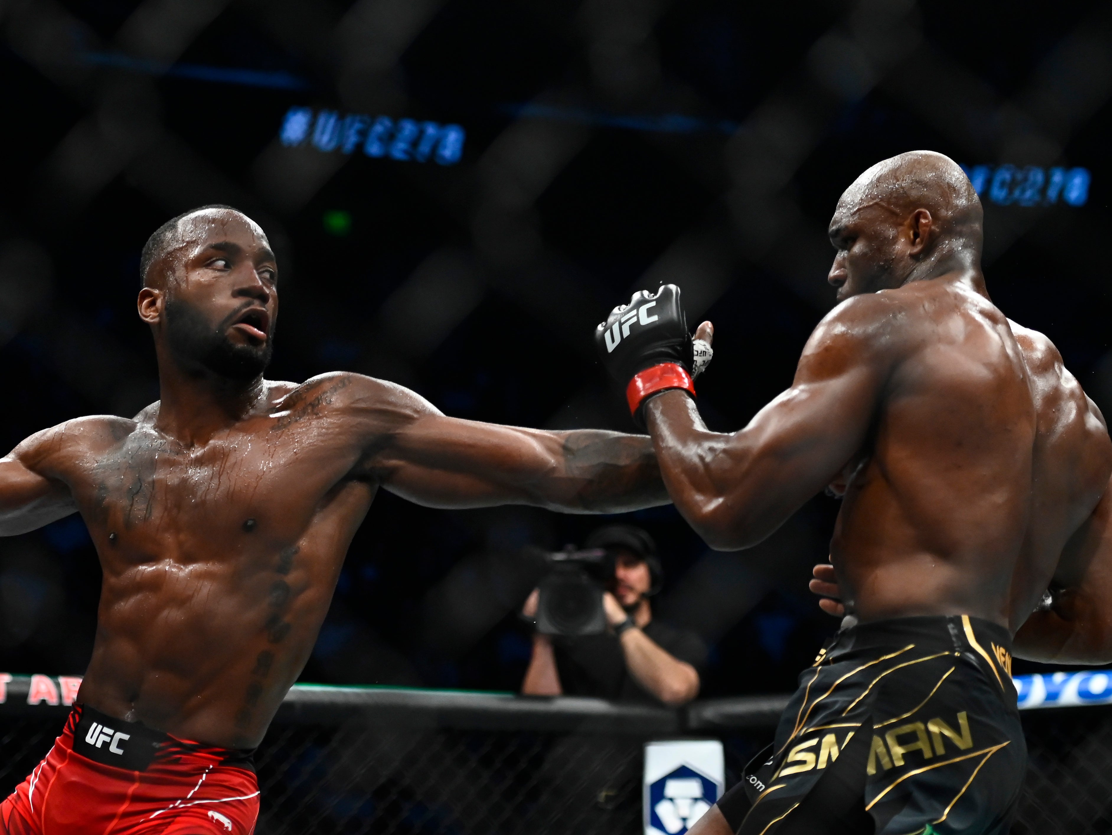 Leon Edwards (left) and Kamaru Usman during their second clash, in August