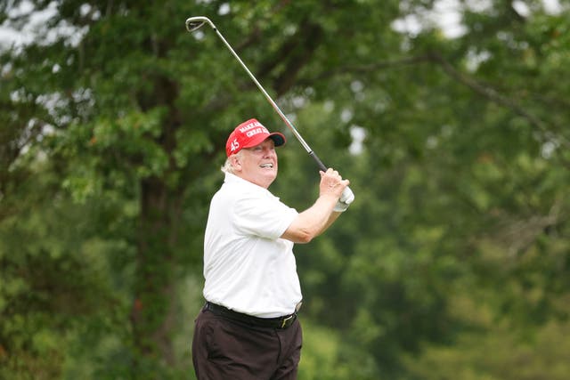 <p>Donald Trump plays his shot from the 14th tee during the pro-am prior to the LIV Golf Invitational - Bedminster at Trump National Golf Club Bedminster in New Jersey </p>